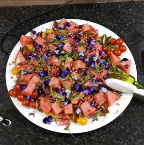 Delicious tomato, watermelon and pansy salad